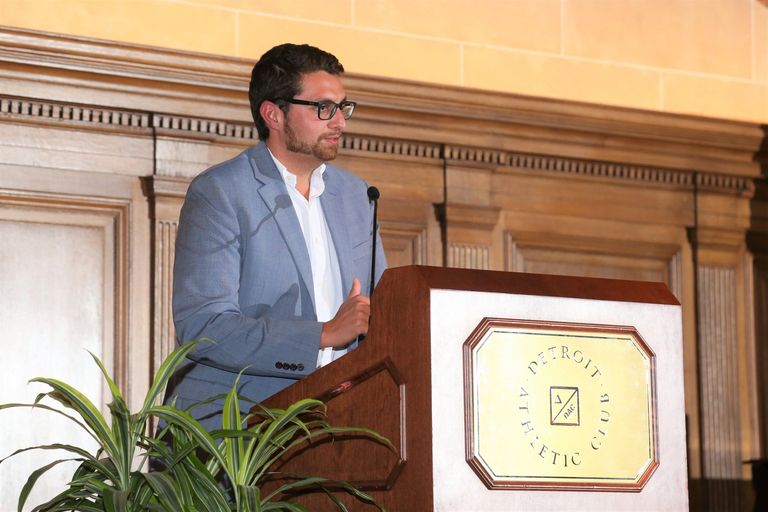 Josh Khan speaking at the Detroit Athletic Club